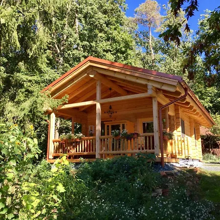 Blockhaus Chalet Mit Beheizbarem Badefass Und Infrarotsauna Auf Der Terrasse Oberschutzen Exterior photo